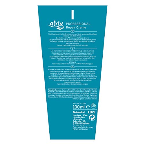 Atrix Crème réparatrice professionnelle – texture crémeuse, application douce pour cheveux abîmés.