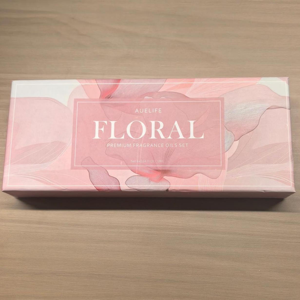Emballage cadeau élégant Auelife pour ce coffret d'huiles florales.