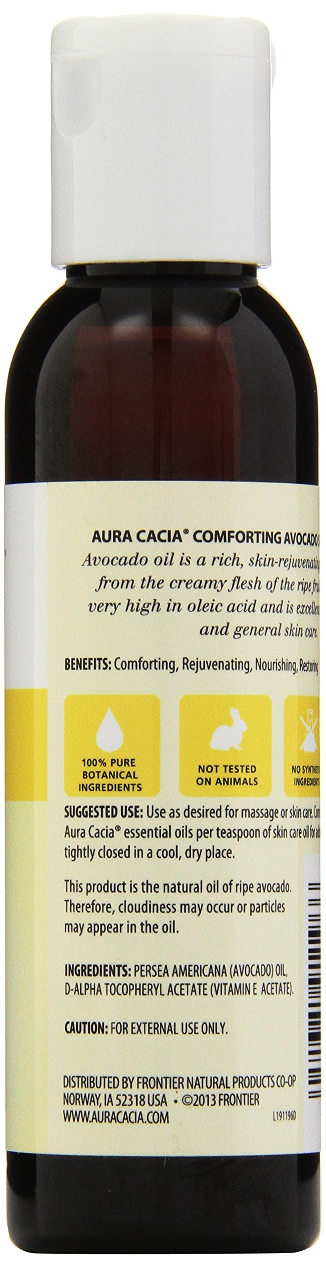Aura Cacia huile avocat – goutte appliquée sur peau pour massage.
