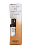 Nettoyage domestique frais avec huile essentielle orange Aura Cacia.