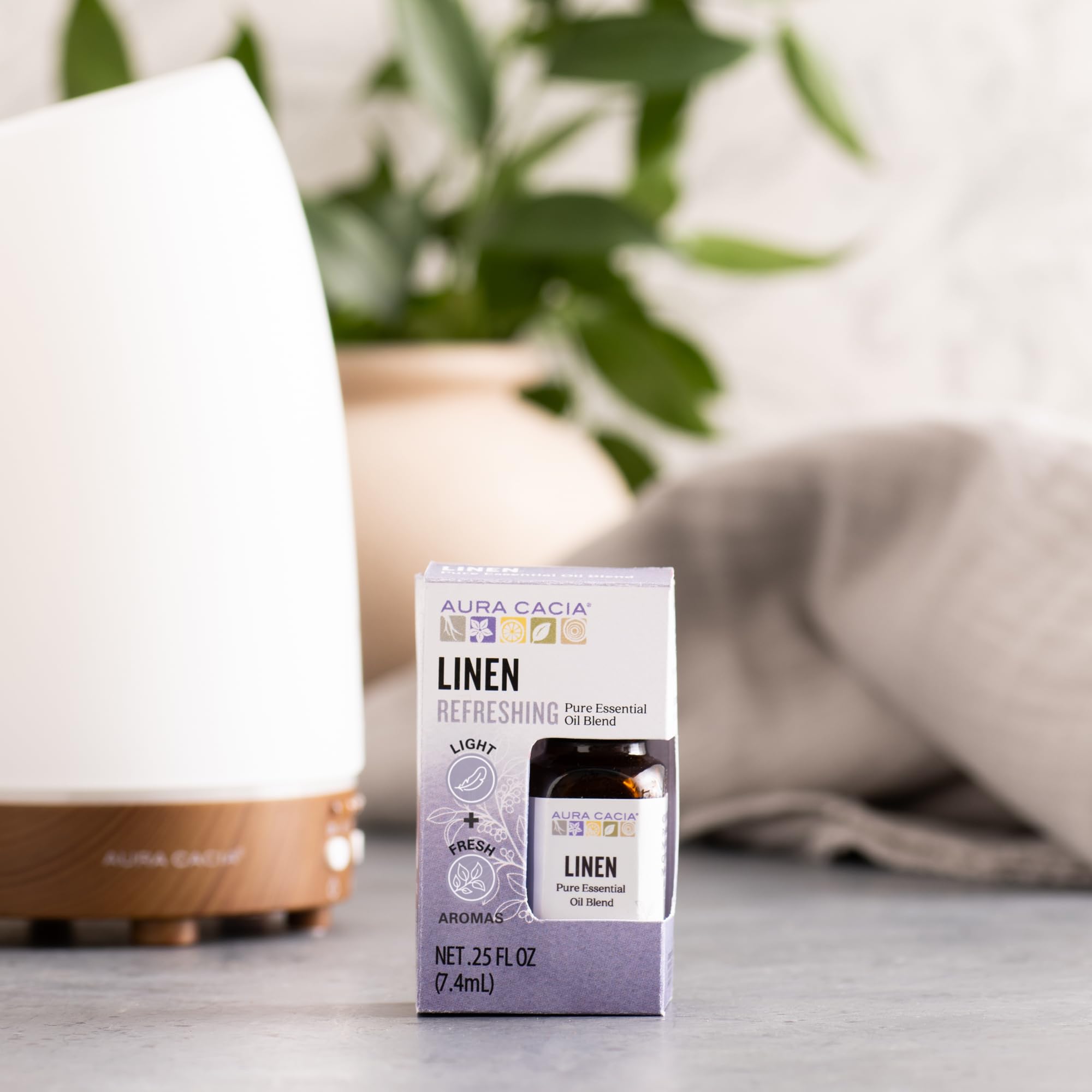 Aura Cacia Linen, arômes eucalyptus et vétiver apportant fraîcheur subtile.