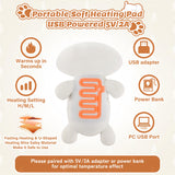Auspicious Beginning chat blanc peluche utilisée comme coussin chauffant portable au bureau.