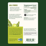 Poudre amla Banyan Botanicals prête à infuser dans une boisson chaude.