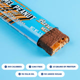 Barebells barre végétale cacahuète caramel intérieur, texture fondante et goût riche.