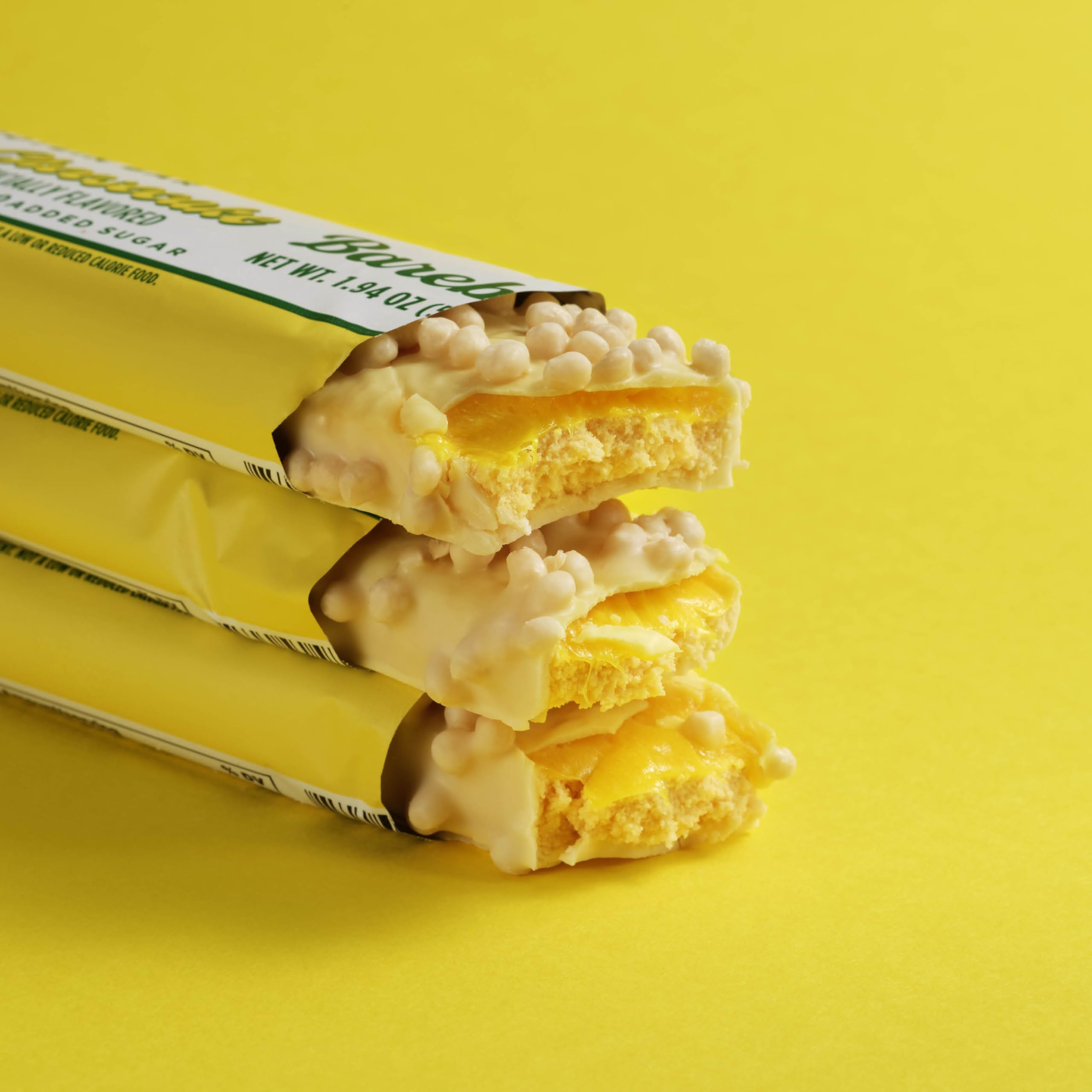 Barre Barebells Lemon Cheesecake en mouvement, idéal en déplacement.