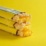 Barre Barebells Lemon Cheesecake en mouvement, idéal en déplacement.