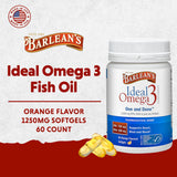Gélules Barlean's Ideal Omega 3 orange dans la main, prise quotidienne pratique.