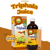 Basic Ayurveda Triphala Juice servi dans un verre prêt à déguster.