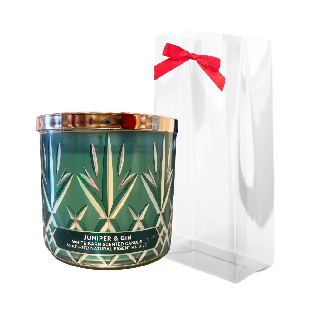 Bath & Body Works Juniper & Gin 3-Wick avec noeud rouge, ambiance festive.