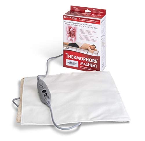 Thermophore MaxHEAT Plus appliqué au genou pour soulager les muscles.