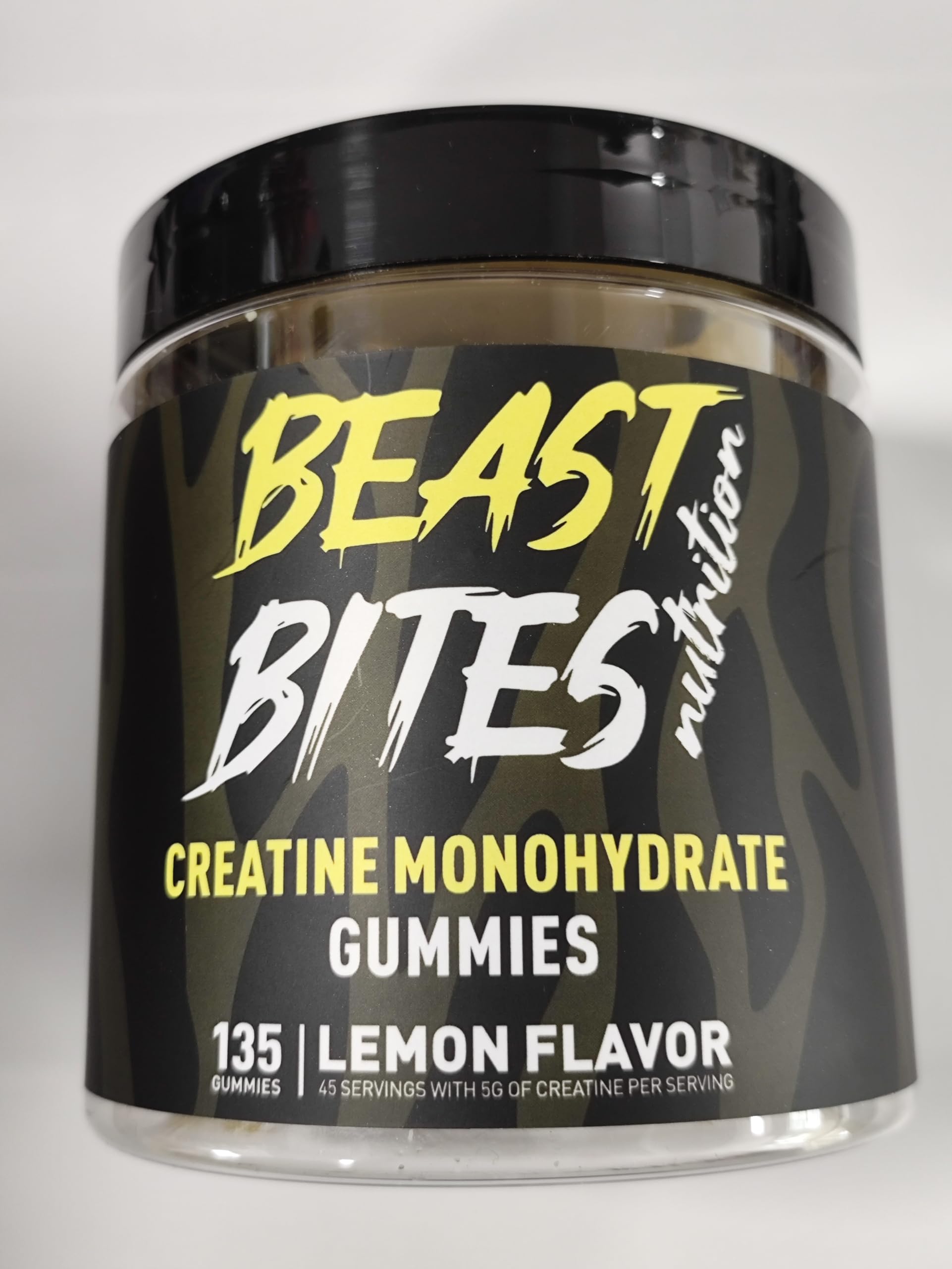 BEAST BITES Nutrition Gommes de Créatine Monohydrate dans une bouteille, couverture de couleur citron.