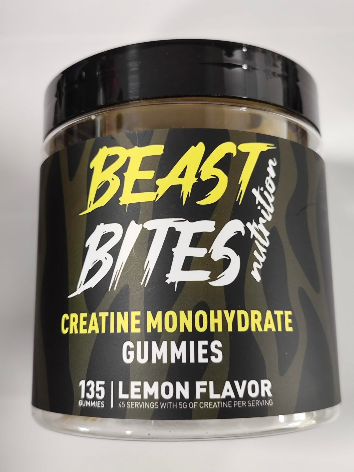 BEAST BITES Nutrition Gommes de Créatine Monohydrate dans une bouteille, couverture de couleur citron.