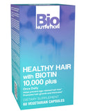 Bio Nutrition Biotine Vegi-Caps: bouteille visible et gélules, soutien potentiel à la routine capillaire.