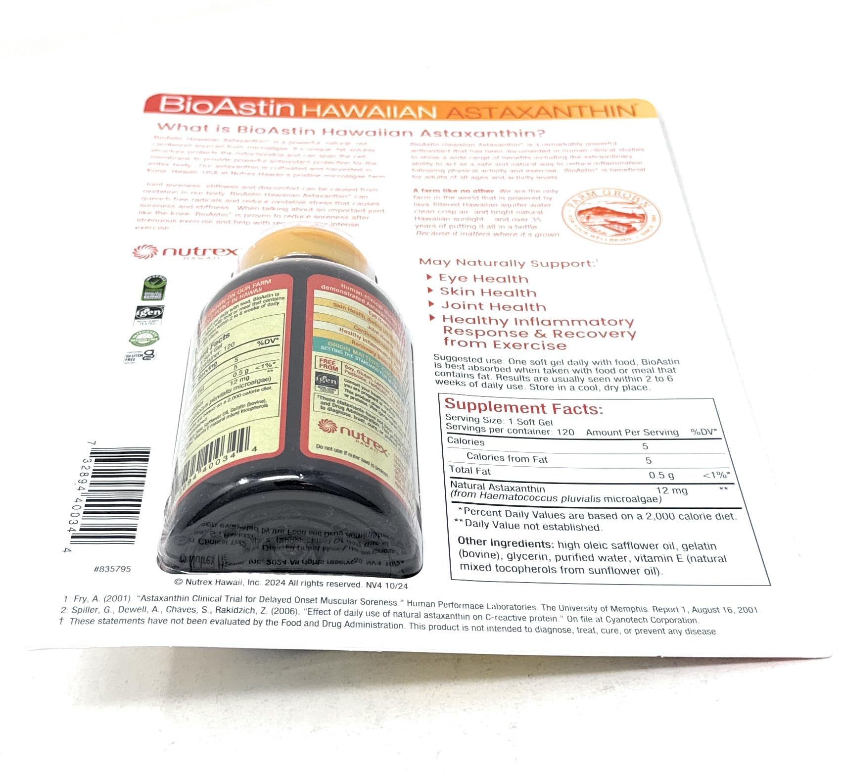 BioAstin flacon transparent montrant des gélules orange.