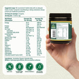 Biogenesis Chlorella – gros plan sur les tablettes vertes et brillantes.