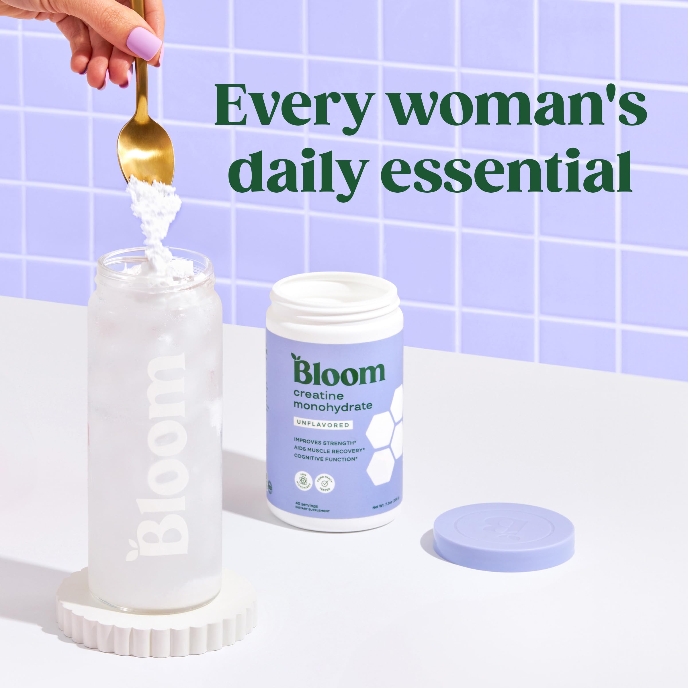 Bloom Nutrition Creatine Monohydrate, cuillère-dose pratique pour dose précise.