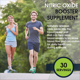 BlueEarth Company cuillère en main – poudre arginine-citrulline framboise