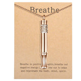 Pendentif BOLAGTIER en or rose pour respiration consciente et calme.