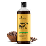 Botanic Hearth huile massage ricin noir jamaïcain en bouteille pour relaxation musculaire.