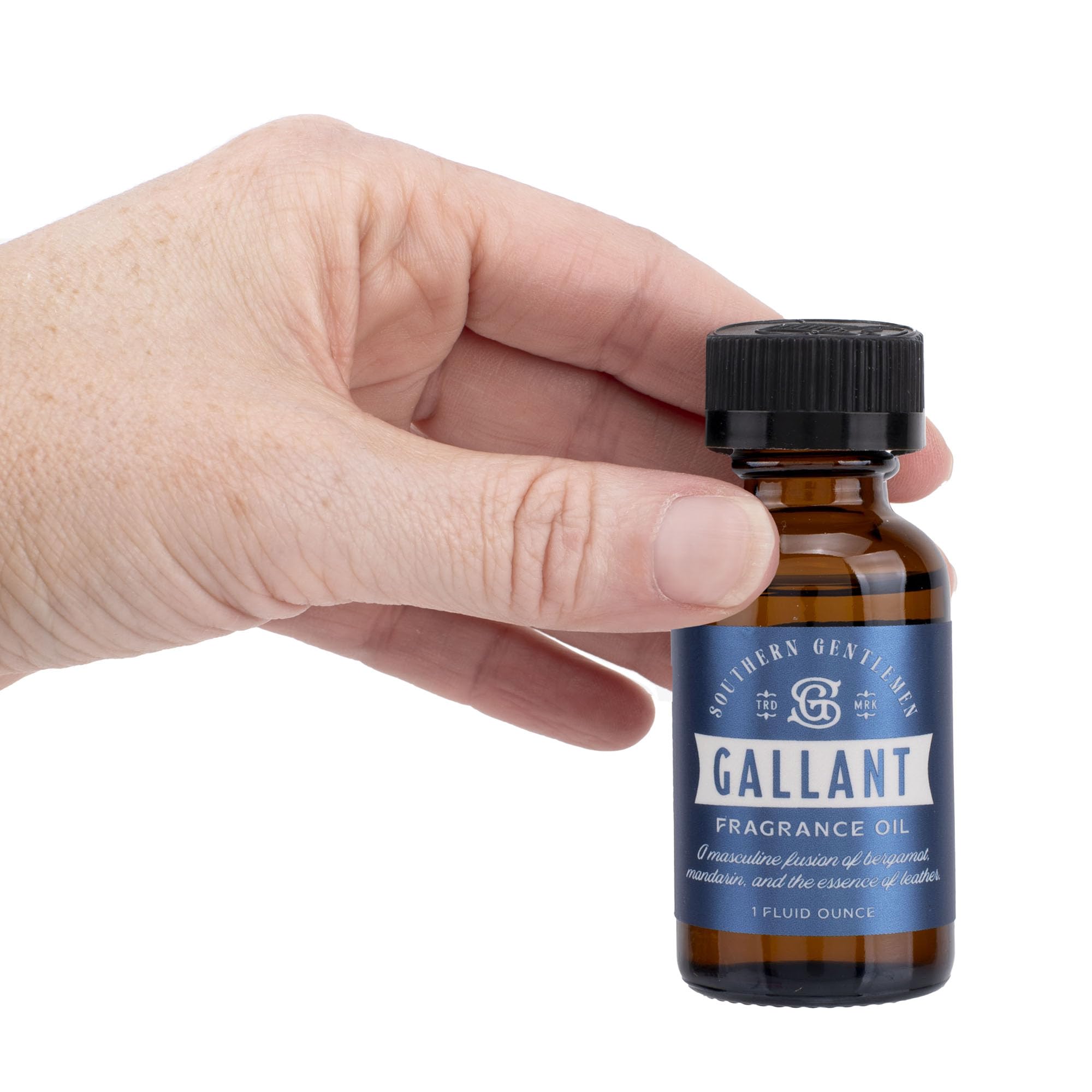 Huile Bourbon Royalty près d’un diffuseur pour créer une ambiance raffinée.