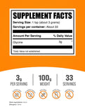BulkSupplements glycine en poudre – doseur indiquant 3 g pour un dosage précis.