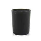 Bougie Byredo Maison-Arbre, emballage élégant, cadeau raffiné pour une soirée cosy.