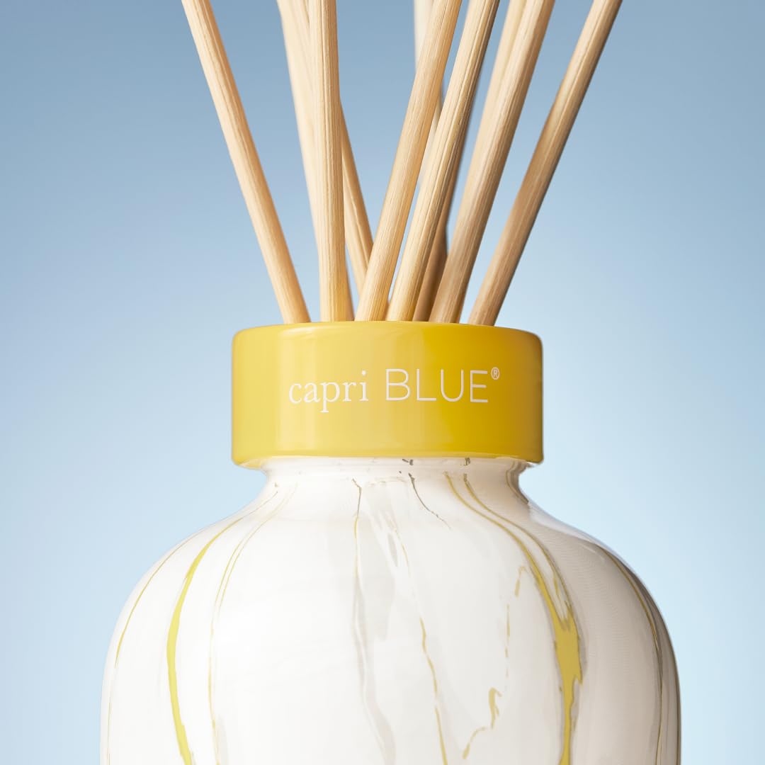 Ambiance parfumée Capri Blue dans la chambre et la salle de bain.
