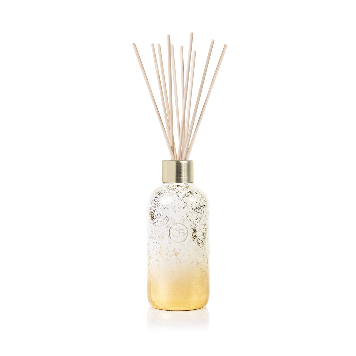 Capri Blue Glimmer diffuseur Volcano, bouteille en verre élégante et parfum durable dans le salon.