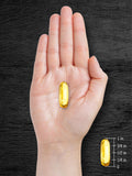 Carlyle – capsules dorées en gros plan, texture et couleur dorée attrayantes.