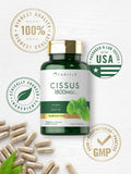 Utilisateur prenant une gélule Carlyle Cissus Quadrangularis lors d'une pause.