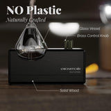 Diffuseur CHEZARTEMIS avec commande en laiton et coque sombre, toucher premium.