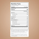 Gros plan sur l’étiquette Clean Simple Eats montrant l’isolat whey pour énergie légère.