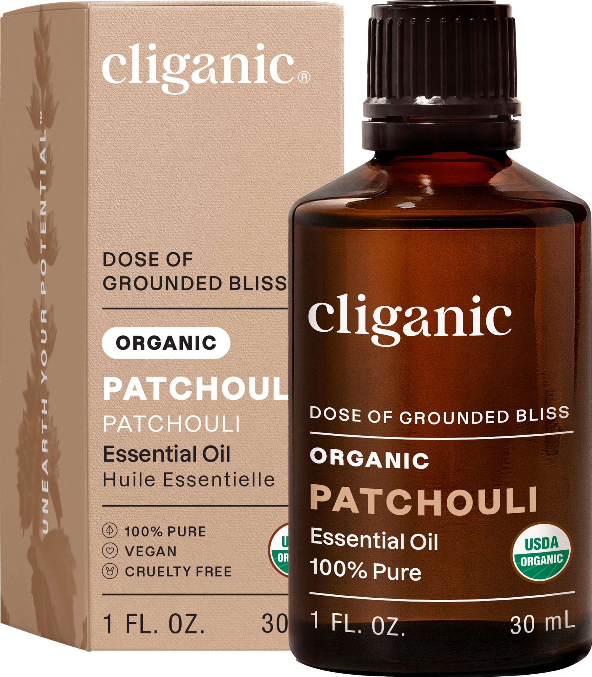 Huile essentielle Patchouli Cliganic dans sa bouteille, parfum terreux durable pour diffusion.