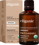 Huile essentielle Patchouli Cliganic dans sa bouteille, parfum terreux durable pour diffusion.