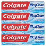 Colgate Max Clean dentifrice moussant dans sa bouteille pour un brossage efficace.
