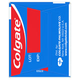 Colgate Total Gel tube en action, pressé pour libérer la pâte.