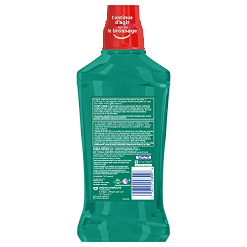 Colgate Total Pro-Shield versement dans un verre pour utilisation pratique
