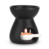 Brûleur ComSaf en porcelaine noire, élégant et durable pour diffuser des arômes.
