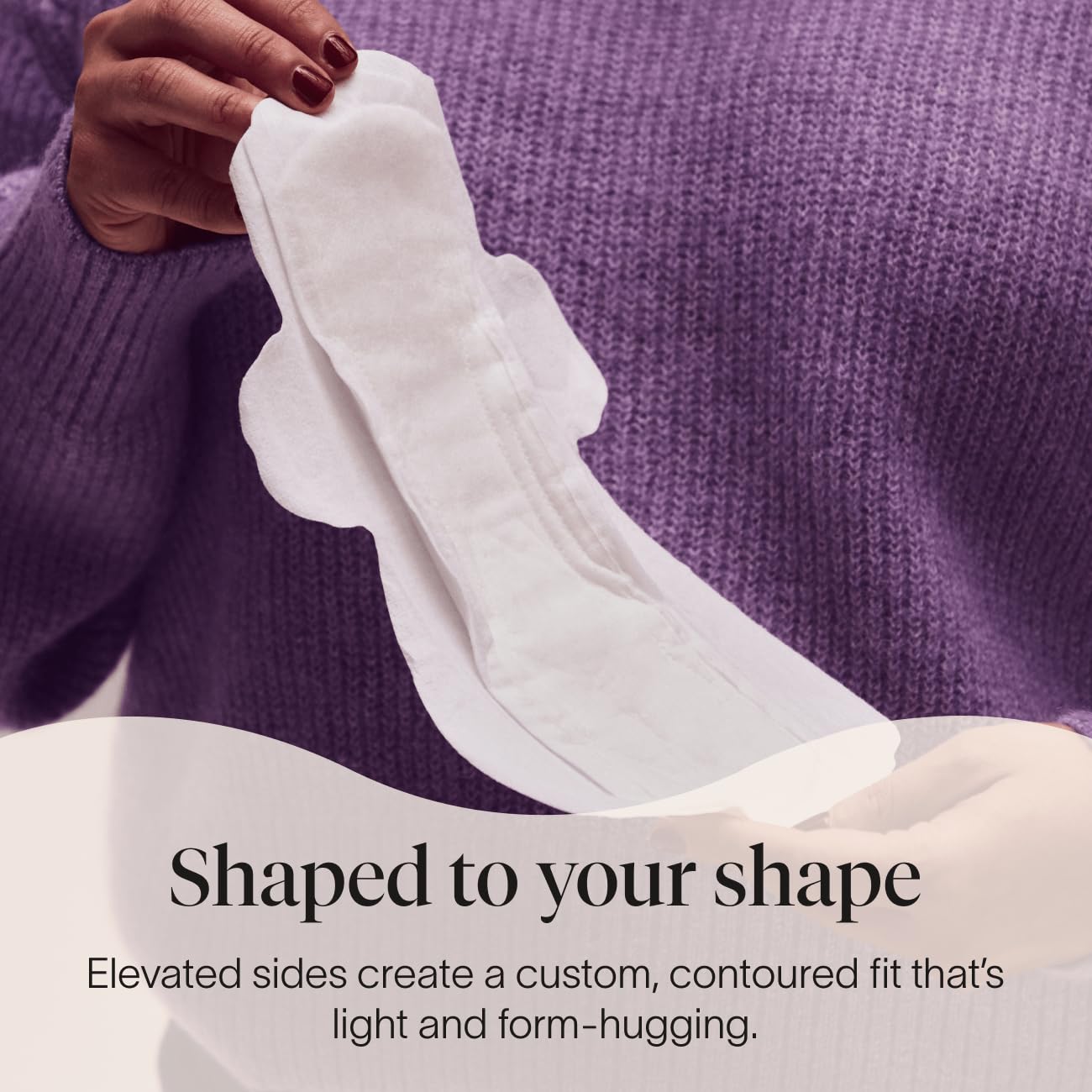 Cora pad forme ergonomique: ajuste au corps pour discrétion.