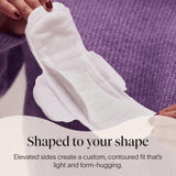 Cora serviette hygiénique — contour-confort, reste près du corps.