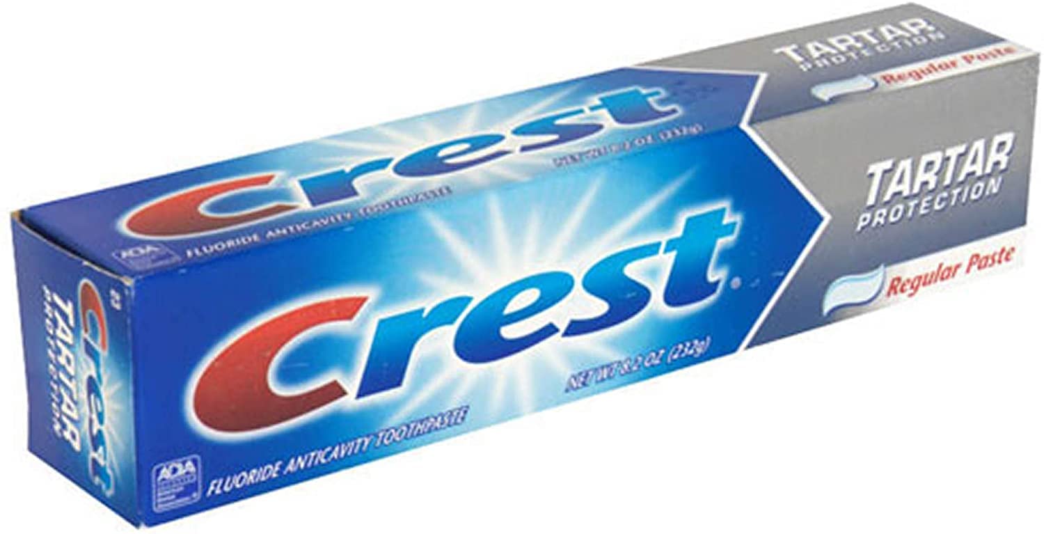 Crest dentifrice anticavité fluoré menthe fraîche utilisé au quotidien.