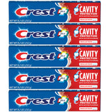 Crest dentifrice fluorure, tubes visibles, idéal pour la routine familiale et la prévention des caries.