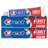 Crest dentifrice protection caries – tube en gros plan, soin quotidien des dents.