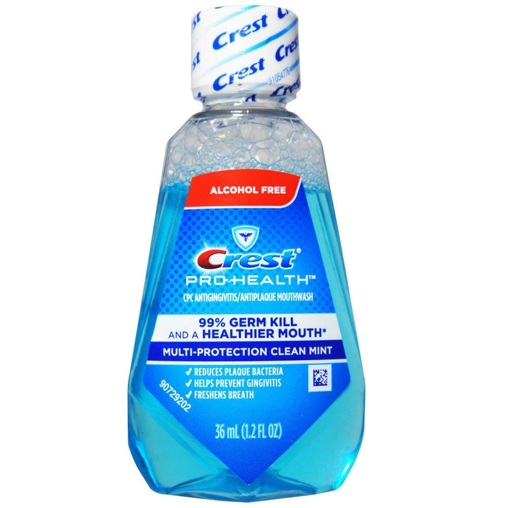 Crest Pro-Health bain de bouche multi-protection menthe fraîche, bouteille, haleine durable.