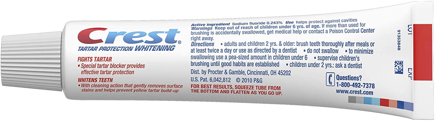 Sourire clair après brossage avec Crest, tartre et cavités à prévenir.