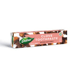 Dabur dentifrice aux herbes girofle, tube visible pour haleine fraîche naturelle.