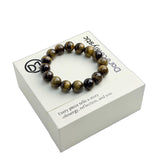 Bracelet Dare to Mystic detail perle 12mm oeil-de-tigre chatoyant.