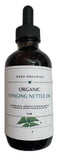Flacon d'huile d'ortie Dash Organics pour nourrir cheveux et cuir chevelu.