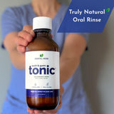 Flacon naturel du tonique dents et gencives prêt à être utilisé