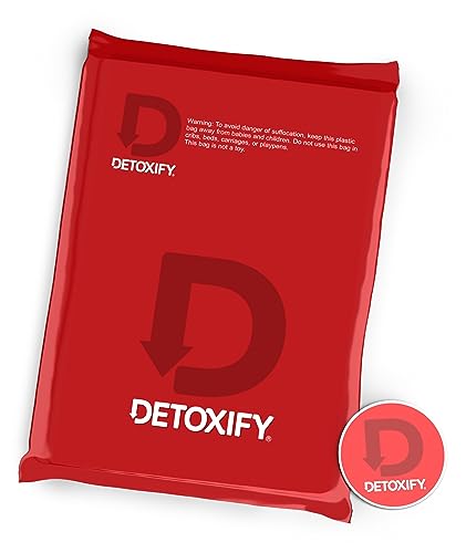 Detoxify Xxtra Clean étiquette lisible sur la bouteille et ingrédients naturels.